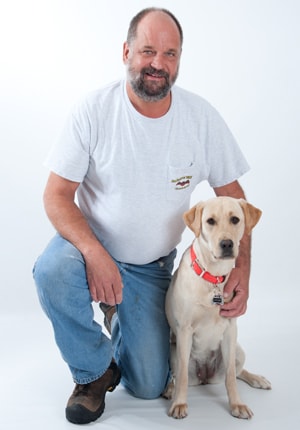 company owner and his dog